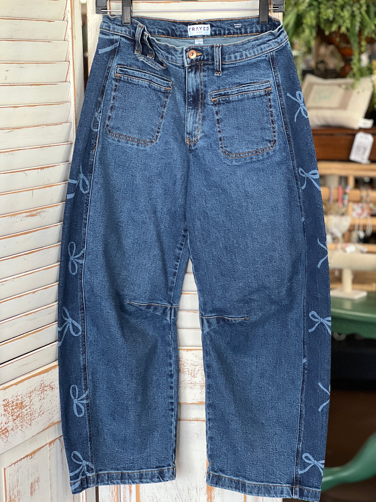 Size 28 Frayed Bow Jeans