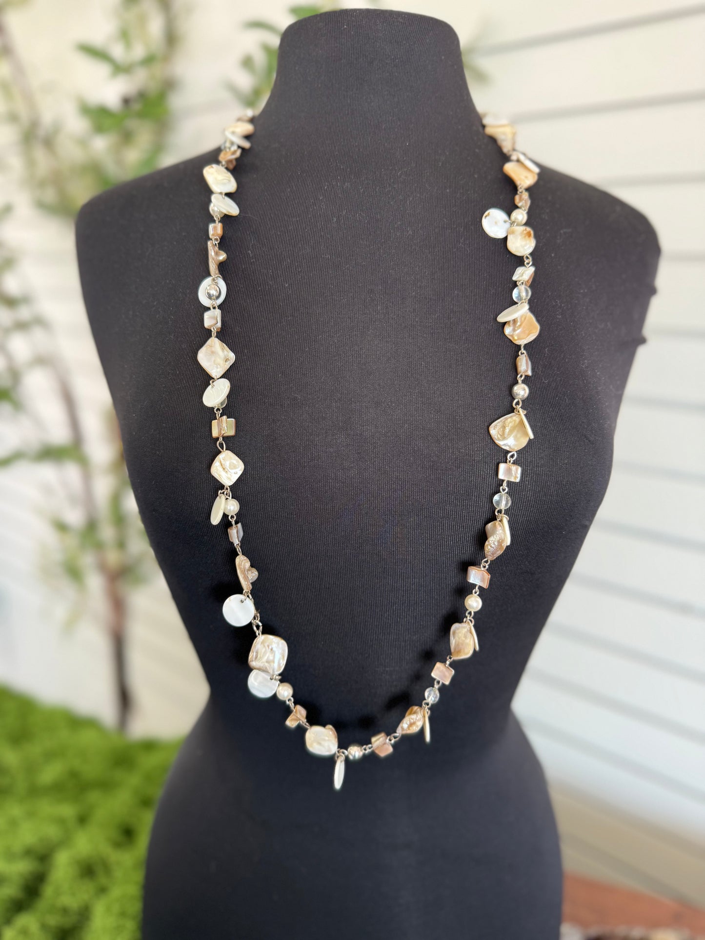 Long gold necklace