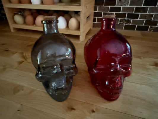 GLASS SKULL HEADS QTY 2